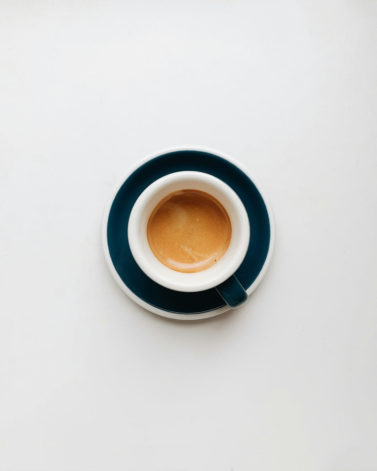 cup of coffee on top of saucer